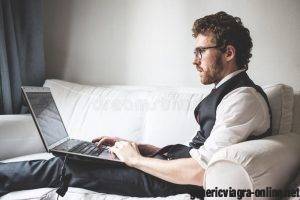 elegant-attractive-fashion-hipster-man-using-notebook-home-34296779